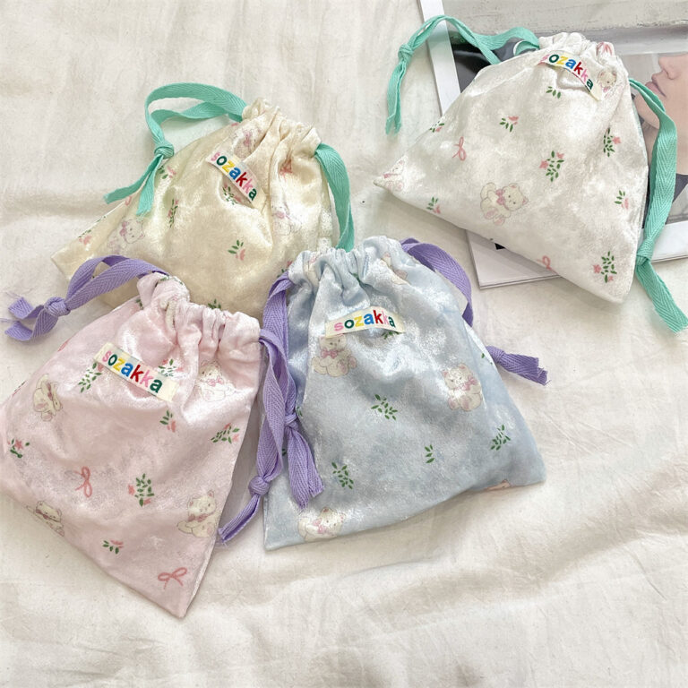 Cartoon bear drawstring pouch for travel storage, makeup, and coin organization