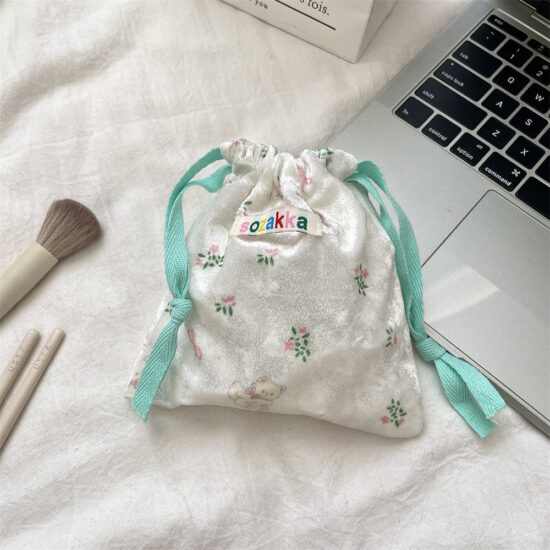 Cartoon bear drawstring pouch for travel storage, makeup, and coin organization