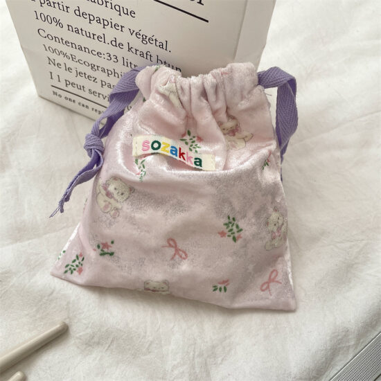 Cartoon bear drawstring pouch for travel storage, makeup, and coin organization