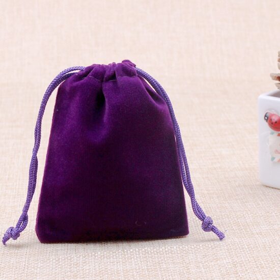 Velvet drawstring pouch for jewelry, phone, and collectible storage

