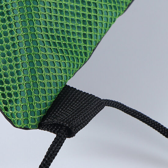 Dual zipper polyester drawstring bag with earphone hole and mesh pockets

