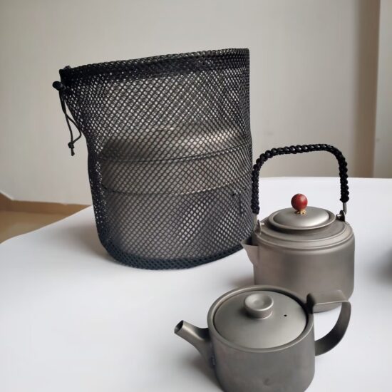 Black drawstring mesh bag with round bottom for outdoor storage
