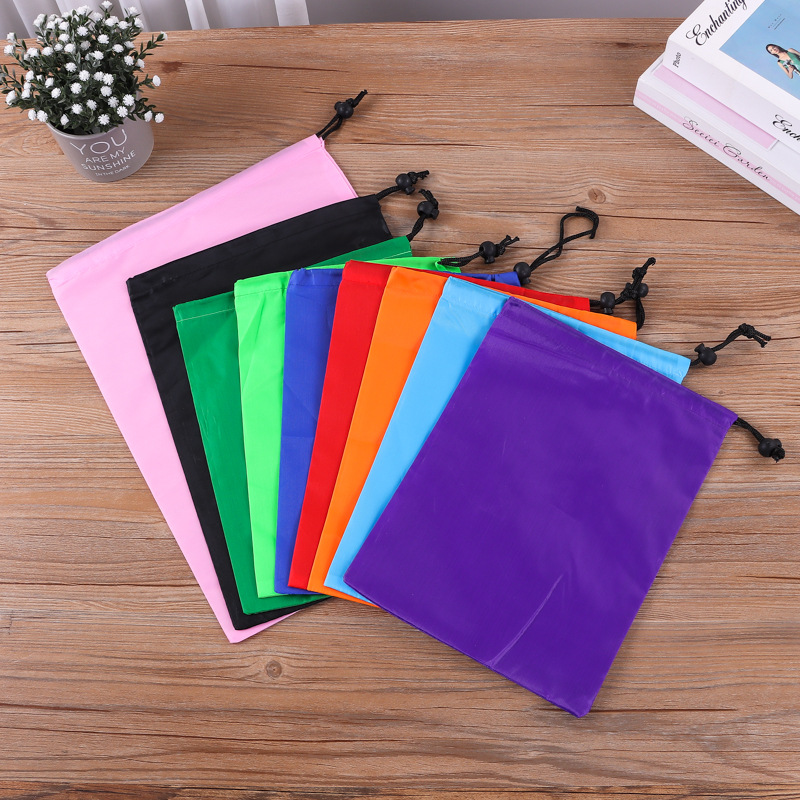 Portable polyester Oxford drawstring bag for clothing storage and packaging