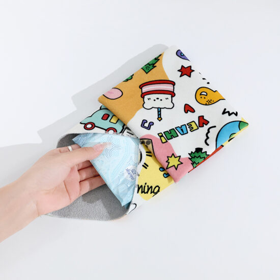 Self-adhesive magic cloth wrap bag for cosmetics, camera lenses, and travel storage

