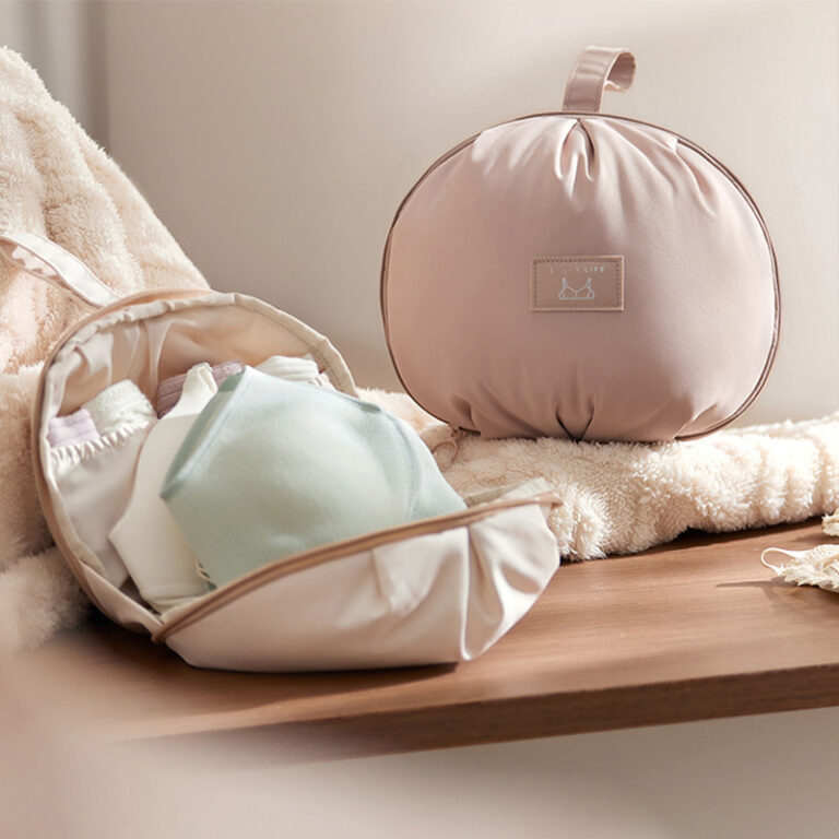 Travel lingerie storage pouch with bra and underwear compartments
