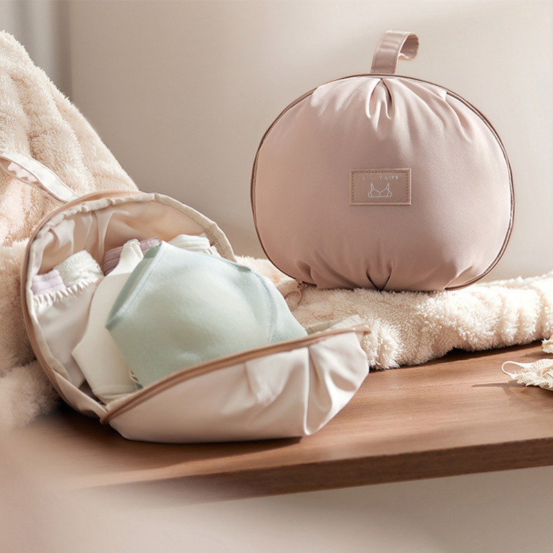 Travel lingerie storage pouch with bra and underwear compartments