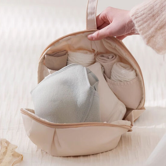 Travel lingerie storage pouch with bra and underwear compartments