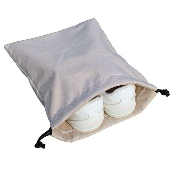 Water-resistant double-drawstring clothing organizer bag for travel and sorting

