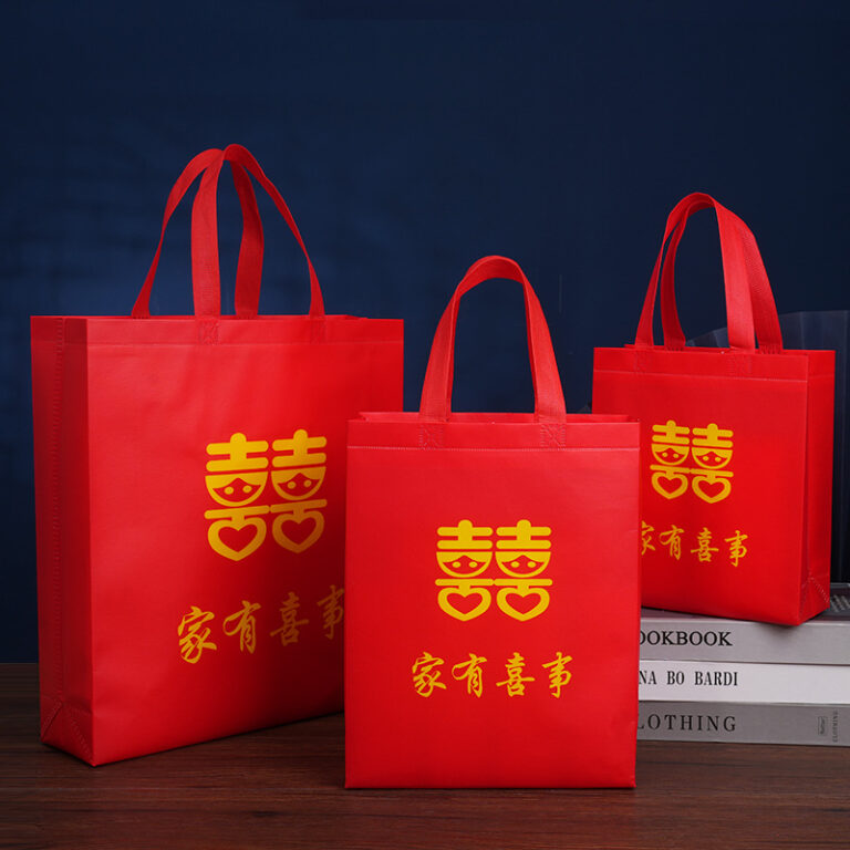 Large red non-woven waterproof wedding gift bag with handle