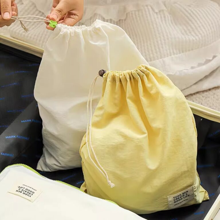 Waterproof nylon drawstring travel bag for organizing clothes