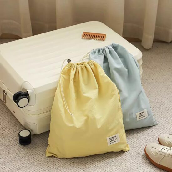 Waterproof nylon drawstring travel bag for organizing clothes