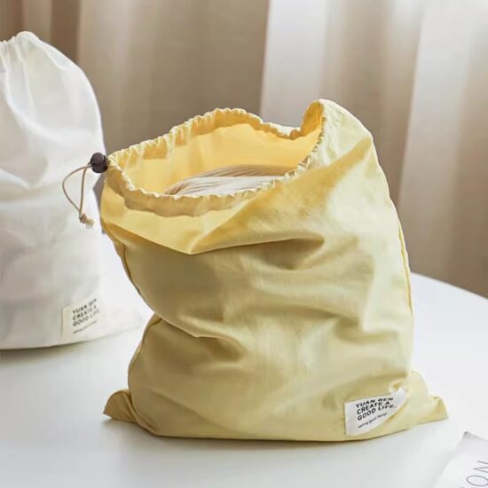 Waterproof nylon drawstring travel bag for organizing clothes